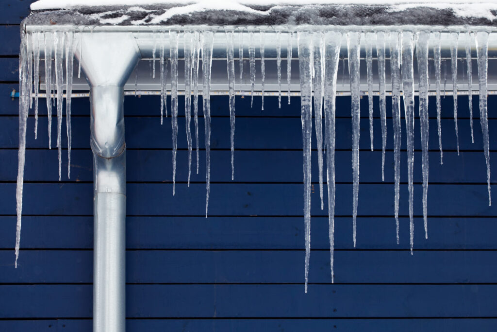 The formation of ice dams on a roof can lead to moisture in an attic as well as other issues